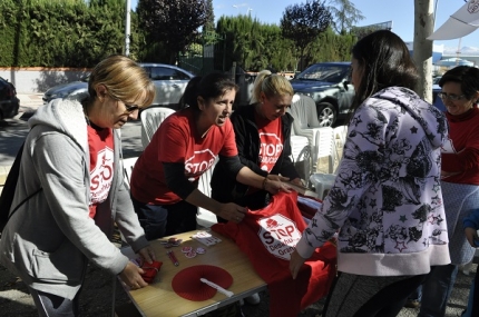 Un stand para venta de productos de Stop Desahucios 15 M 